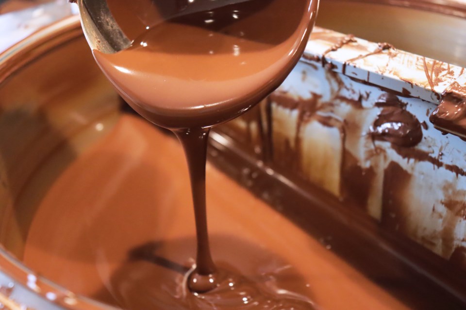 Chocolate gets poured at Obsession Homemade Chocolate in Okotoks. (Joanna Oakden/Submitted)