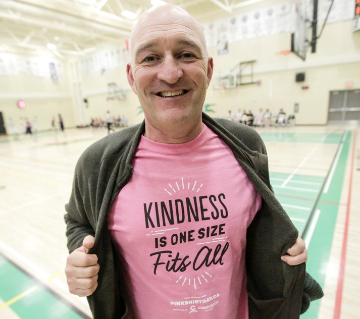 Brent Calver/OWW
St. John Paul II Collegiate teacher Joe Buck wears a Pink Shirt Day t-shirt from a previous year. This year's Pink Shirt Day is Feb. 24. (Brent Calver, Western Wheel)