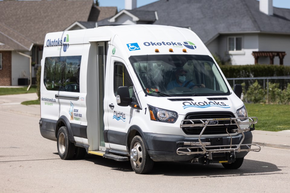 An Okotoks Transit shuttle turns into a cul-de-sac in Crystal Ridge. The Town is adding a regular bus route to its public transit service.