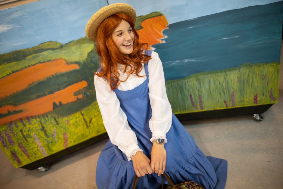 Lucie Killam rehearses as the titular character of  L.M. Montgomery's Anne of Green Gables on July 18, produced by the Dewdney Players. The play will mark the first in-person performance by the Okotoks theatre group since the start of the pandemic.