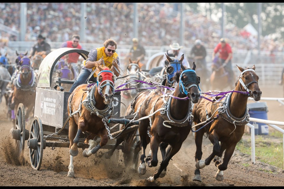 Chanse Vigen of Mossleigh comes out of the start with a wide lead in the championship heat of the WPCA Battle of the Foothills chuckwagon races on July 25. He went on to win the championship, taking home $30,500.