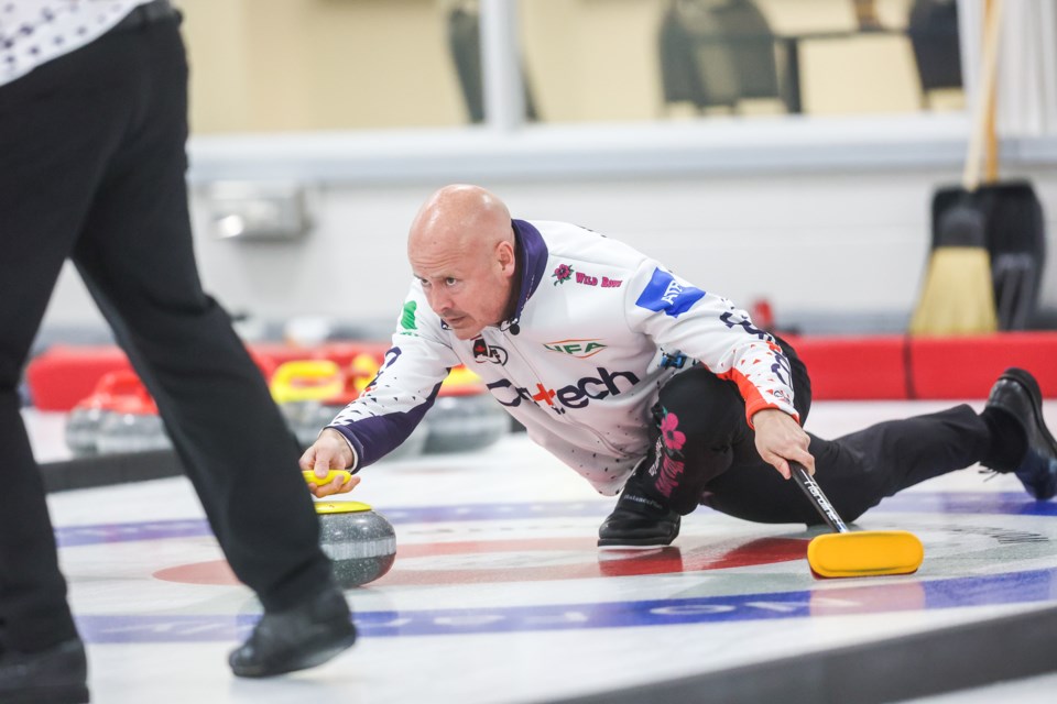 Kevin Koe releases a shot during the 2021 ATB Okotoks Classic at the Okotoks Curling Club on Sept. 26. Koe defeated Ross Whyte 6-1 to win the $9,000 first prize.