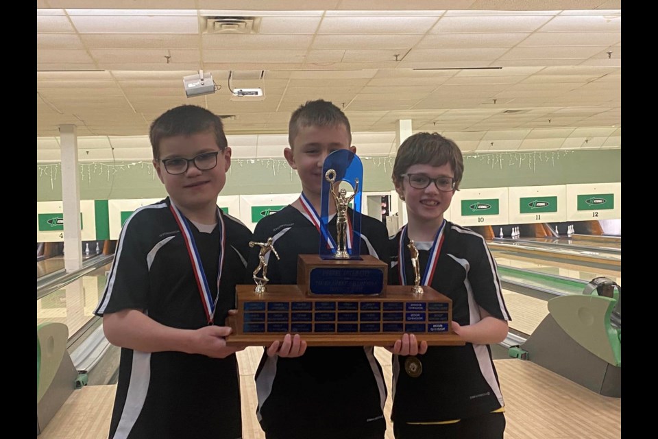The Millennium Lanes team of Andrew Honish, Bennett Flentje and Carter Richard won the boys team event at the Calgary Intracity Championships. (Photo submitted)