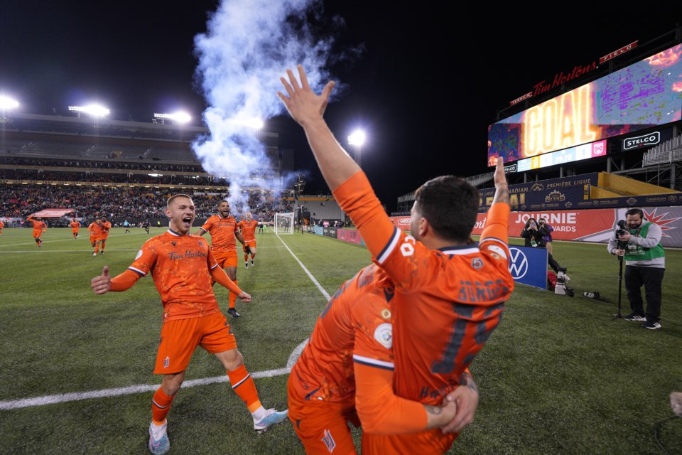 Forge FC celebrates Tristan Borges' game winning goal directly from a corner kick during extra-time in the 2-1 victory over Cavalry FC in the CPL Playoff Final on Oct. 28 at Hamilton's Tim Hortons Field. (CPL Photos)