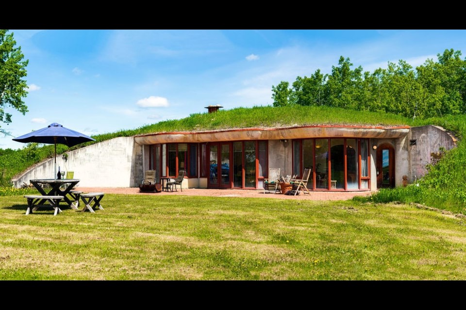 The sod-covered "Hobbit House" and surrounding 160 acres of protected land is on the market for $1.4 million. (Photo courtesy of CIR Realty)