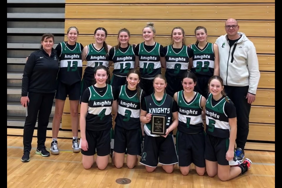 The Holy Trinity Academy Knights pose after winning bronze over the Our Lady of the Rockies Grizzlies on Feb. 4 at the Bishop Carroll Cardinals tournament. 