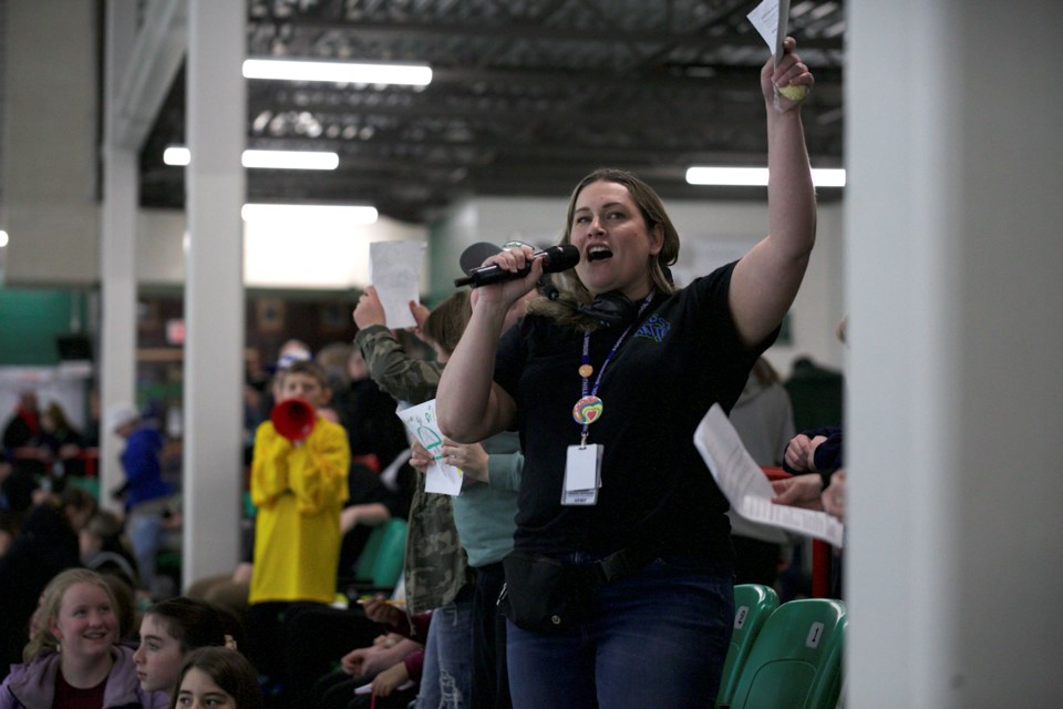 Teresa Ferrario, manager of Minds Matter, speaks during the first intermission of the Okotoks Oilers’ annual Hockey Game for Mental Health on Feb. 13 at Okotoks Centennial Arenas. 
