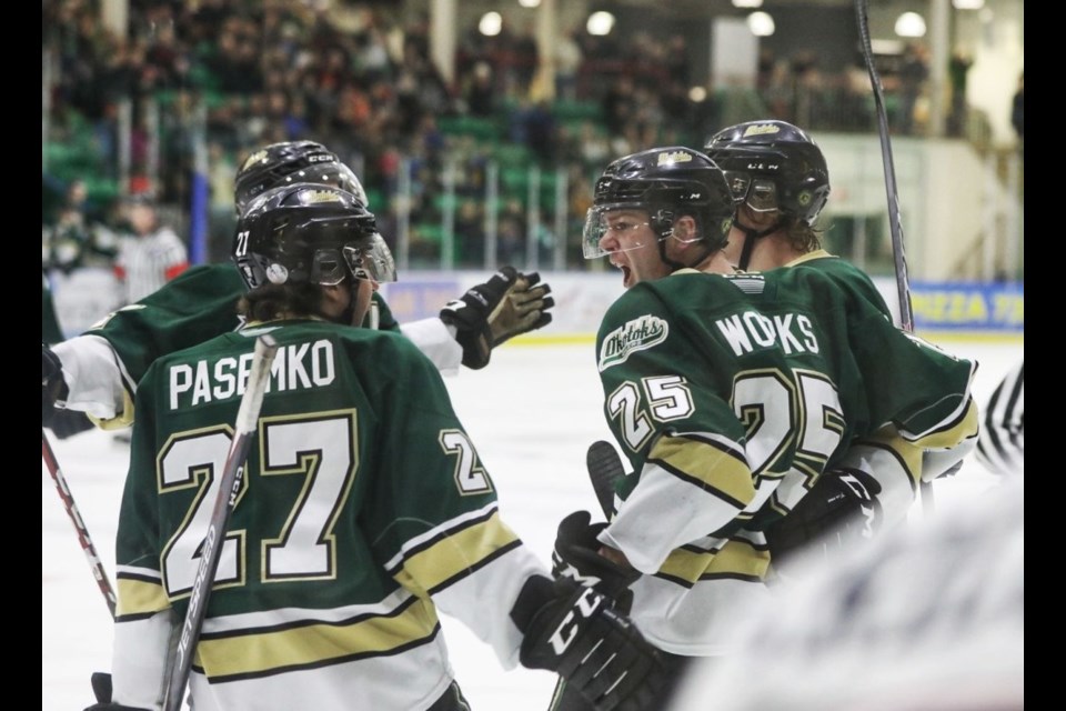 Okotoks Oilers forward Jack Works celebrates his first period goal with teammates during the 4-3 victory over the Brooks Bandits on Jan. 3 at Pason Centennial Arena.
(Brent Calver/Western Wheel)