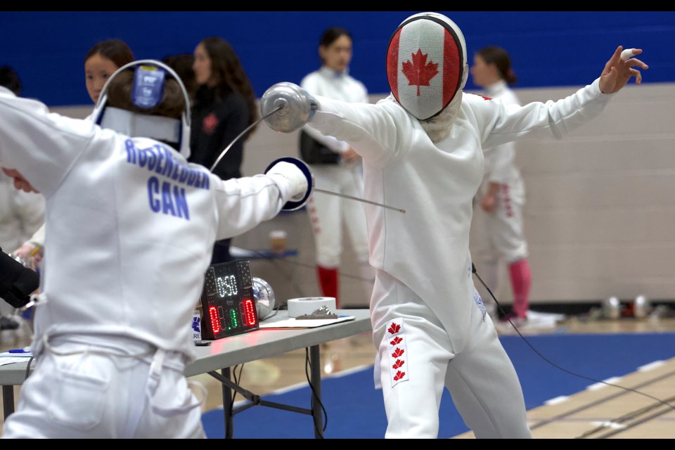Athletes compete in fencing at the Okotoks Recreation Centre during the 2025 Modern Pentathlon National Championships on July 26.