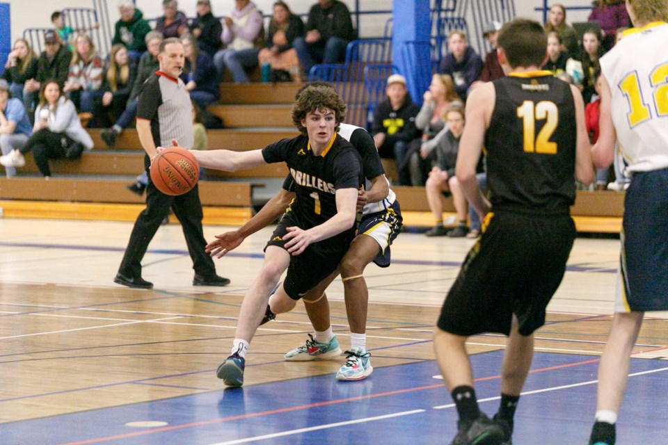 Oilfields Driller Connor Crane drives to the basket during the 2A Boys South Central Zone gold medal game versus Carstairs’ Hugh Sutherland Kodiaks on March 9 at Strathcona-Tweedsmuir School. The Drillers won to advance to the ASAA 2A provincials for the first time in 20 years. (Remy Greer/Western Wheel)