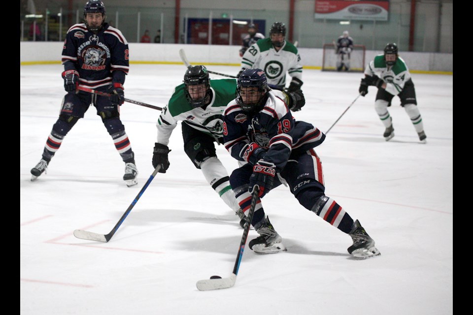 Carstar Okotoks Bisons defenceman Kegan Law rushes the puck up ice during the team’s 7-0 win over the Rocky Rams in Game 3 of the HJHL semifinal series on March 9 at the Murray Arena.