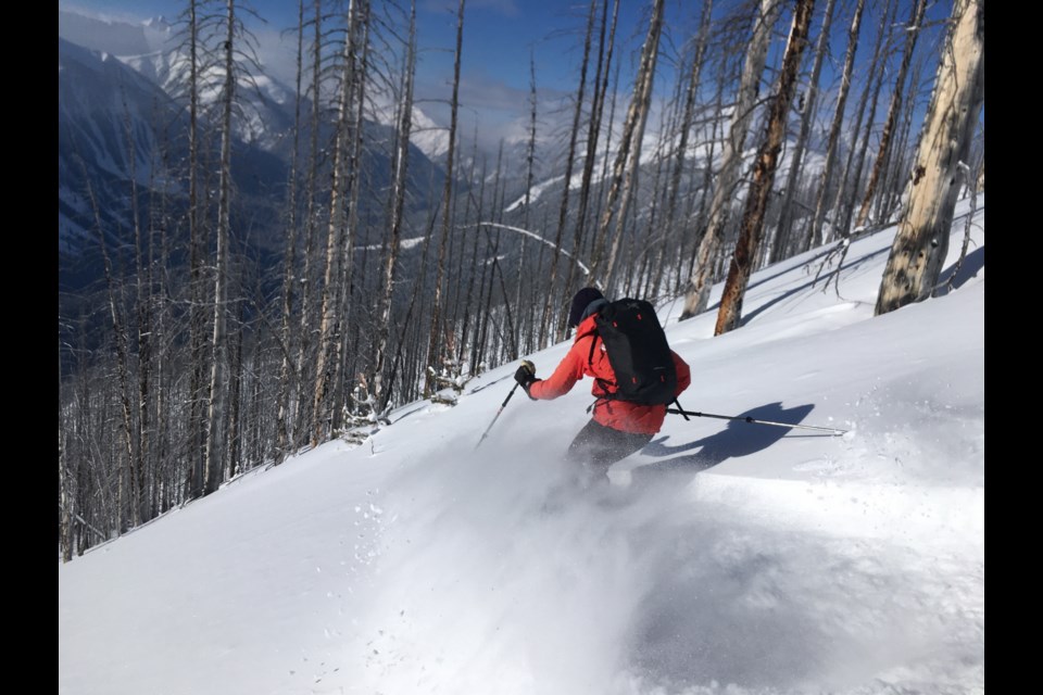 Former Okotokian Tyson Rettie skies in the backcountry. Rettie launched the Braille Mountain Initiative to provide backcountry alpine opportunities for the visually impaired. (Photo submitted)