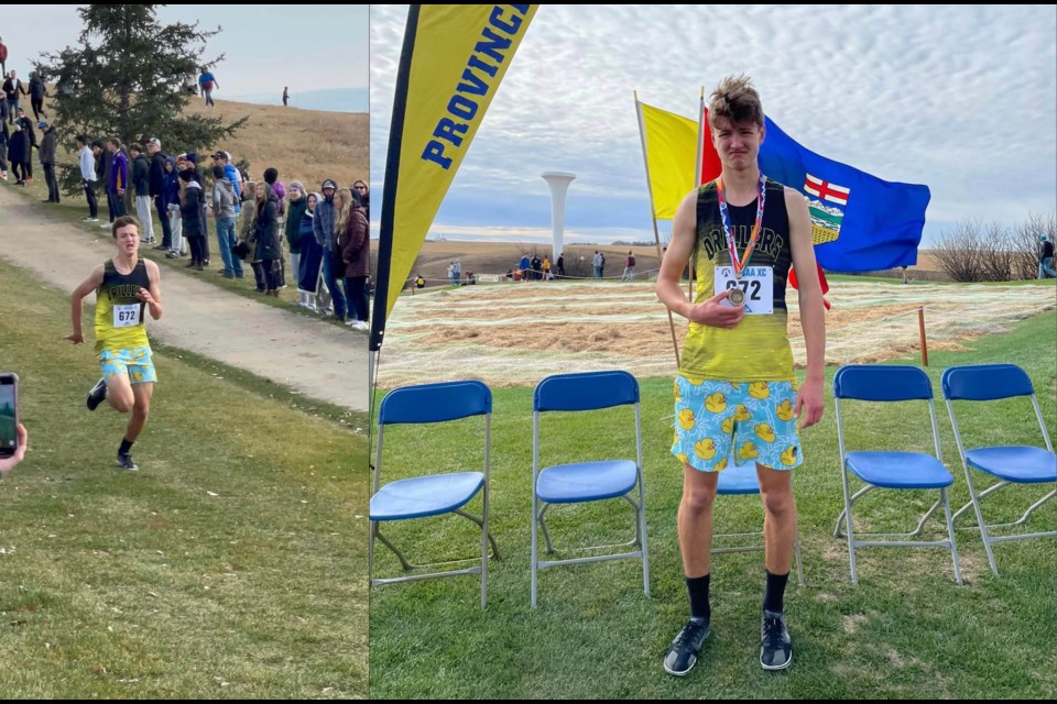 Oilfields Driller Grade 10 student Carver Morris poses with the junior boys gold medal won at the Alberta Schools’ Athletic Association Provincial Cross-Country Championships on Oct. 21 in Trochu. (Photo submitted)