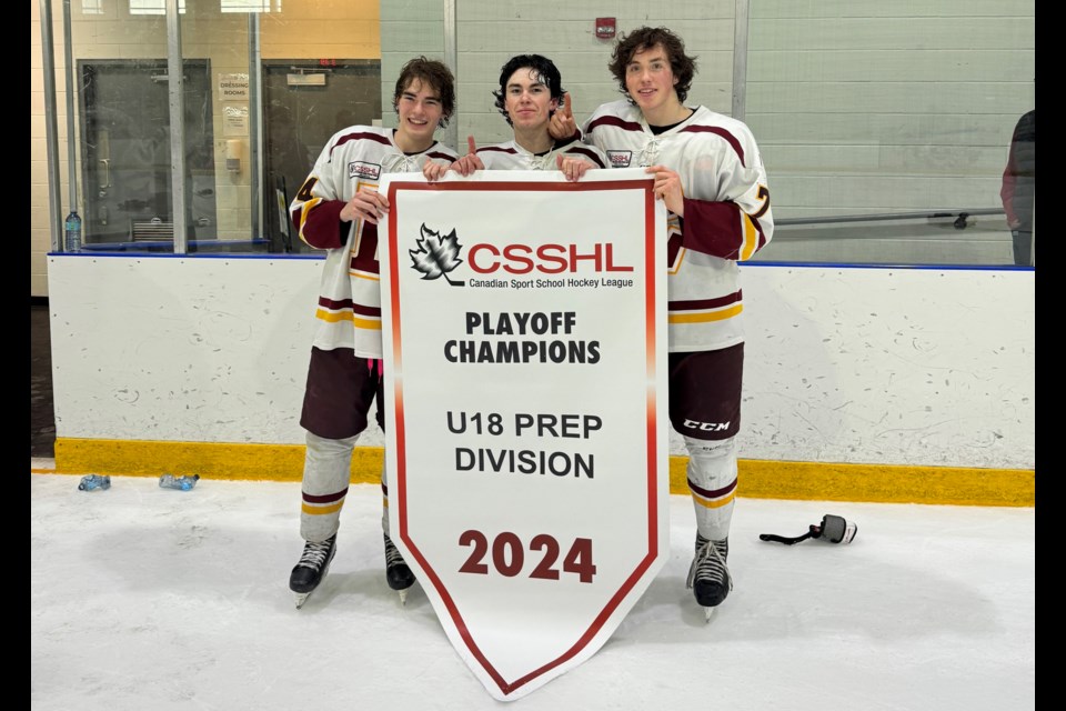 Edge Mountaineers skaters and Okotoks minor hockey alumni, from left, Brayden Schwartz, Lochlan Tetarenko and Samuel Laplante, pose with the Canadian Sport School Hockey League U18 Prep Western Championship. Edge defeated NAX 3-2 in overtime to take the title on March 17 in Penticton, B.C. (Photo submitted)