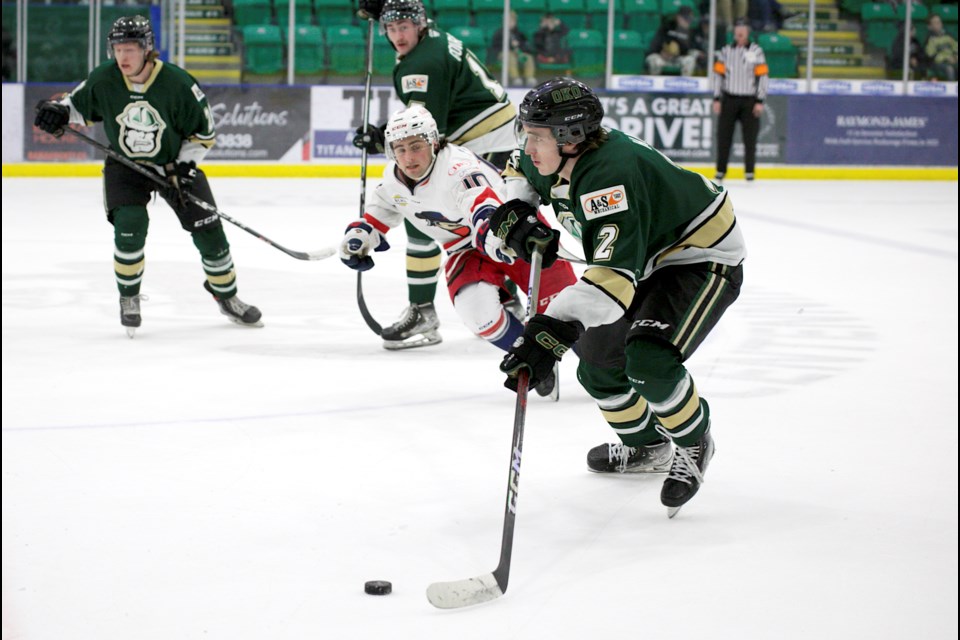 Okotoks Oilers blueliner Sam Hall starts a rush during the 6-3 loss to the Brooks Bandits in BCHL action on March 31 at the Okotoks Centennial Arenas. 