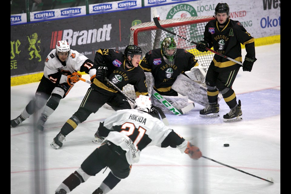 Okotoks Oilers forwards Owen MacNeil skates the puck out of trouble rebound during the 6-1 win over the Lloydminster Bobcats on Jan. 5 at Okotoks Centennial Arenas.