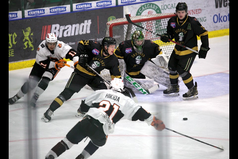 Okotoks Oilers forward Owen MacNeil skates the puck out of trouble rebound during the 6-1 win over the Lloydminster Bobcats on Jan. 5 at Okotoks Centennial Arenas.