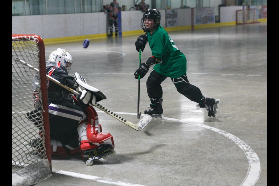 The Calgary Outlaws play an exhibition match as part of Exposure Day held by the South Central Inline league and Alberta Minor Roller Hockey Association on April 7 at the Piper Arena. (Remy Greer/Western Wheel)