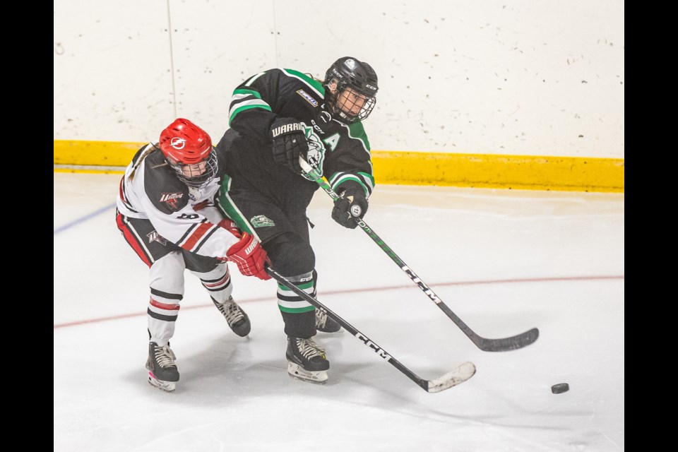 Abby Graham of the Rocky Mountain U18 AA Raiders fires a shot versus the Airdrie Lightning in their home opener at Scott Seaman Sports Rink on Oct. 29.  The Raiders won by a 7-5 score.