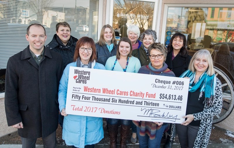The Okotoks Western Wheel raised 54,613.46 for its Western Wheel Cares Charity Fund in 2018. On hand to accept the donation were representatives from the eight charities that 