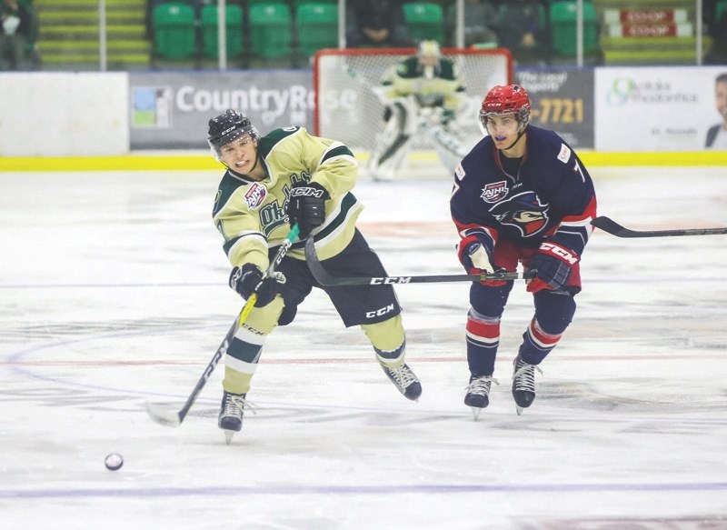 Okotoks Oilers defenceman Nick Blankenburg, left, will bring his high energy style to the Michigan Wolverines next season.