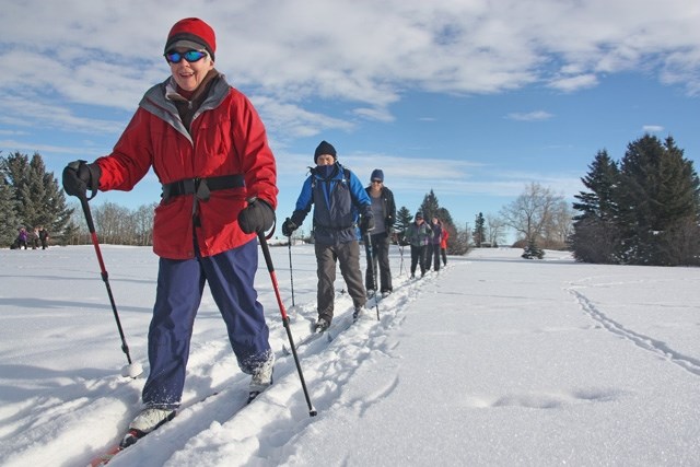 Sheep River Rambler Carol Johnson and other members of the local hiking group ski the Turner Valley Golf Course Jan. 5.
