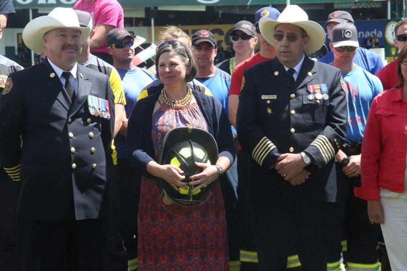 MD of Foothills Fire Chief Jim Smith, Terri Steeves of TransCanada Pipeline and High River Fire Chief Len Zebedee at Spruce Meadows in 2016 during the announcement of