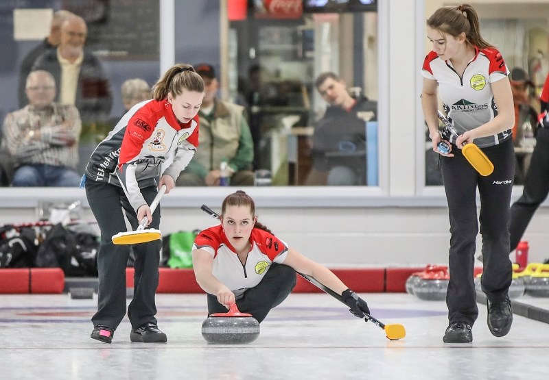 Team Bakker&#8217;s Rhiley Quinn of Okotoks comes out of the hack during the Optimist U18 Women&#8217;s Curling Provincial at the Okotoks Curling Club. Team Bakker won the