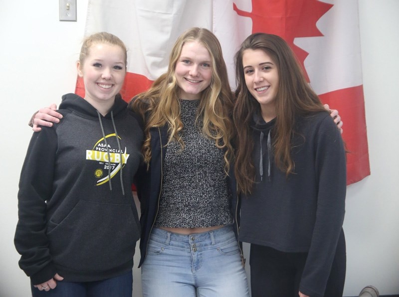 Foothills Composite French Immersion student Nicole Zacaruk, Ireland McAnally and Lindsay Aitken were among 17 students from the public school system who took off for France