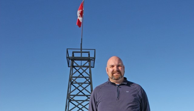 Turner Valley Golf Club general manager J.D. Scheller stands near a derrick that&#8217; s similar to one being built by his staff for the Jack Bowman Interpretive Trail.