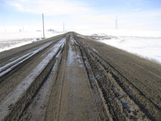 The MD of Foothills has applied a limit of 75 per cent load weight to all paved and gravel roads, and closed down 232 Street East, shown here, due to deteriorating conditions.