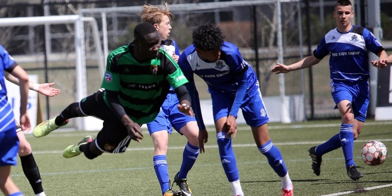 Foothills FC Moses Danto takes flight to heads the ball towards the Edmonton Academy net on May 5 in Calgary. Foothills FC makes it debut at the Foothills Comp soccer pitch