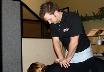 The stress of the holidays can be hazardous to your health proclaims Dr. Danny Desaulniers, shown here performing an adjustment at his A.D.I.O. Chiropractic clinic. He has