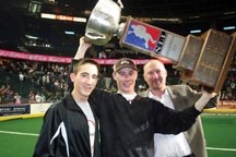 Brad Banister celebrates the Calgary Roughnecks&#8217; 2009 championship with sons Raymond and Mitch. Banister has put the Roughnecks up for sale.