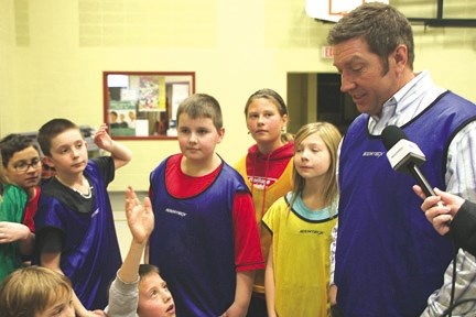 Former Calgary Flame Sheldon Kennedy speaks with Heritage Heights School students on Thursday during the introduction of the Respect in School program the Foothills School