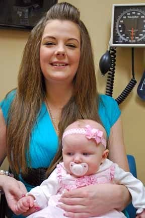 New mom Alisha Bassett with her three-month old daugther Drea. Bassett, from Nanton, gave birth at the Low Risk Clinic at the High River Hospital with the help of midwife