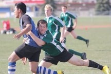 Reid Watkins, here making a tackle for the Holy Trinity Knights, has made the Team Canada U-17 team.