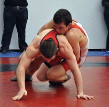 Reid Watkins of the Okotoks Wrestling Club takes an opponent to the mat en route to winning the Alberta Open Juvenile championship at 69kg last weekend in Edson.