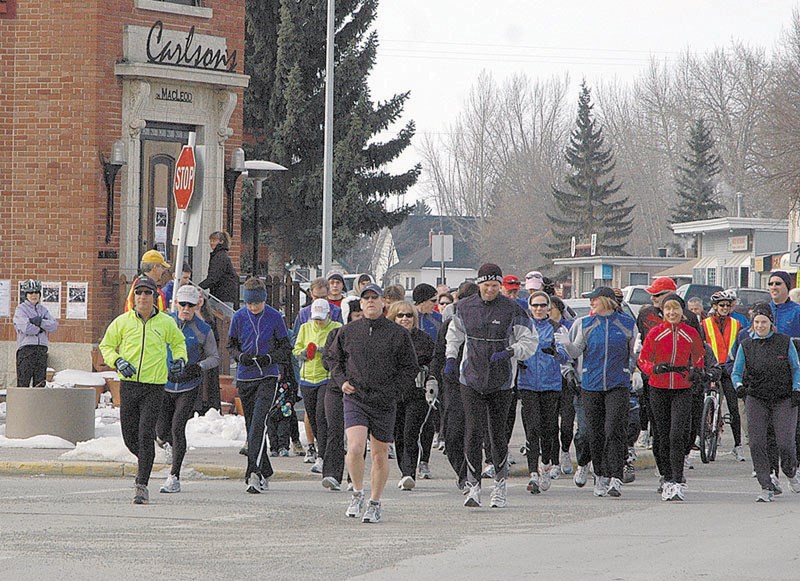 Participants in the Friendship Run head for Okotoks after leaving High River in 2009, the event is organized by the Big Rock Runners. The locally based Big Rock Runners meet