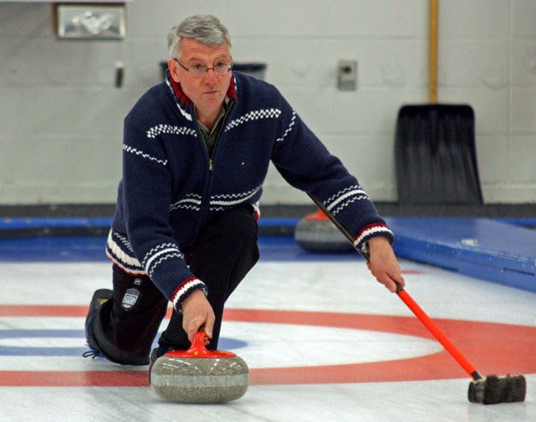 John Steel of the Highwood Curling Club delivers a rock during the &#8216;B&#8217; final against the Koyota rink on Sunday at the Okotoks Curling Club. Steel finished 10th in 
