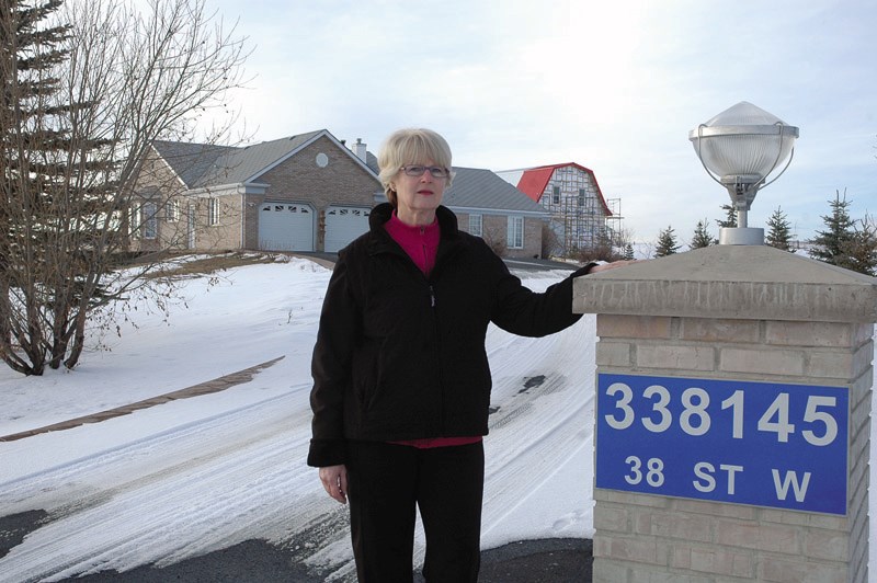 Willy Gannon waited 45 minutes for an ambulance to arrive at her home just six minutes west of Okotoks when she called an ambulance in February 2010. Her husband, who has had 