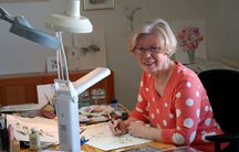Linda Le Geyt Paterson paints a piece of botancial art in her home studio. She will be giving an informative presentation on the precision art form tomorrow April 7 at the