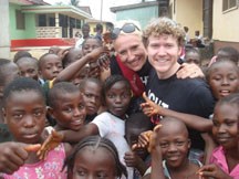 Kyle Shewfelt talks with children in Liberia while doing charity work for Right to Play earlier this month. The 2004 Olympic gold medalist is the guest speaker at the