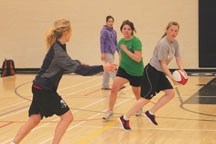 The Holy Trinity Knights girls rugby team practices indoors due to poor weather on April 13. Last weekend&#8217;s winter storm has also caused the cancellation of the April