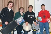 Holy Trinity Academy students, from left, Cameron Ayles, Megan Gusdal, Dylan Jones and Glendon Hass are four of the Holy Trinity Academy band mates who departed for Cuba