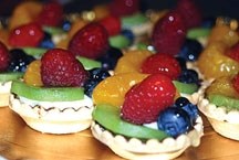 Mini fruit tarts prepared by the foods class at Holy Trinity Academy will be one of many samples available to enjoy at the art show on May 30. The show will display pieces of 