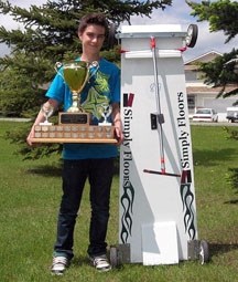 Sheldon Fyten shows off his speedy 2011 soapbox racer along with some first prize hardware. The 13-year-old Okotoks resident says his triumphant runs down Crystalridge Drive