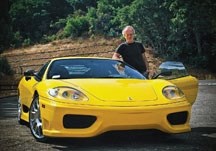TV and film director, Stuart Gillard, shows off one of the rewards of a successful Hollywood career. Even with a fast car, the show business professional likes to slow things 