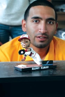 Former Okotoks Dawg Manny Kumar was honoured to have the Manny Kumar Bobblehead doll given to fans at Seaman Stadium on Friday.