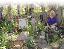 Diane Moodie is captured within the confines of her prize winning garden. Her unusual combination of plant life and found objects will be part of this year&#8217;s Big Rock